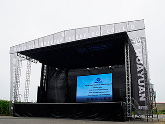 Large portable stage trailer with triple axle and anti-slip birch flooring